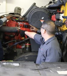 Diesel Technology students working on the cab of a semi truck