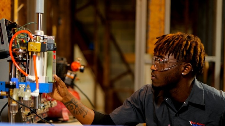 Student working on industrial trade