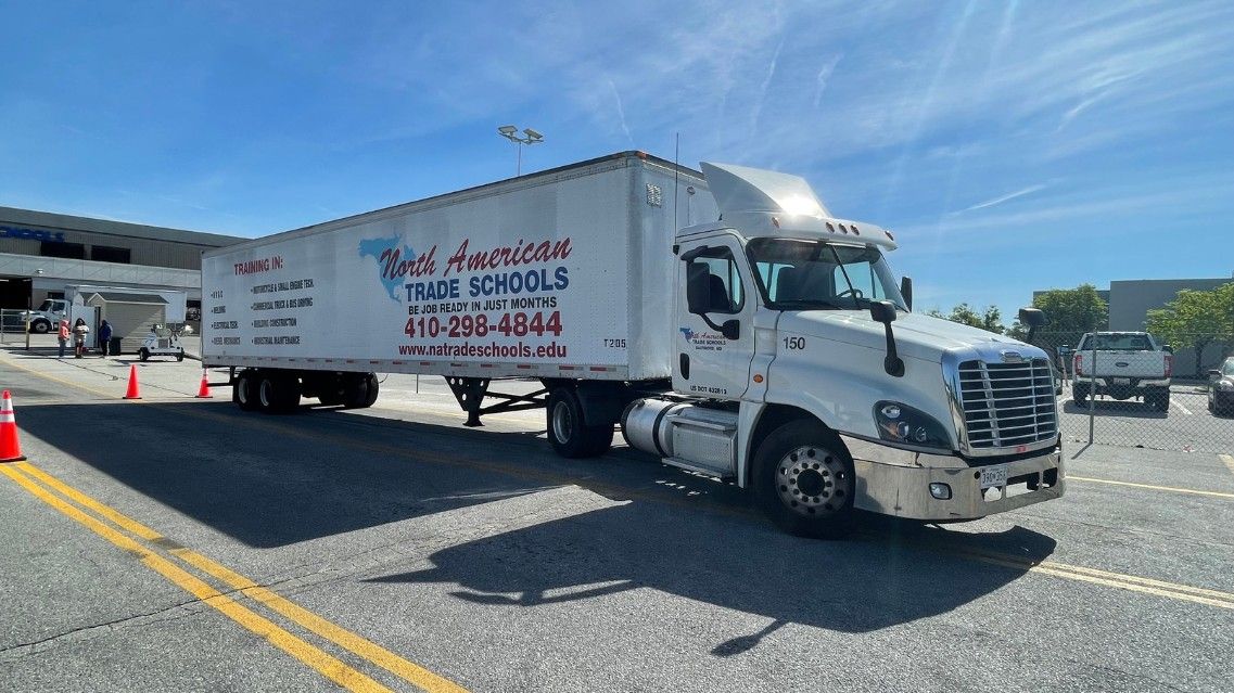 Side view of NATS semi truck on training yard